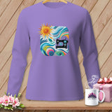Purple long-sleeve shirt with a colorful square graphic of a sewing machine and sun.