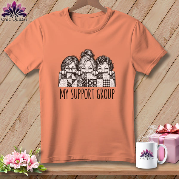 T-shirt with three women peeking over a quilt, text "MY SUPPORT GROUP".