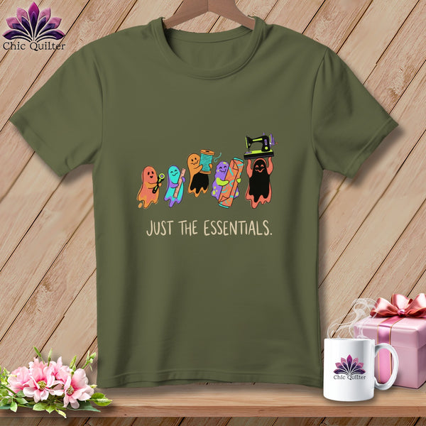Olive green t-shirt with ghosts holding sewing items and text "JUST THE ESSENTIALS."