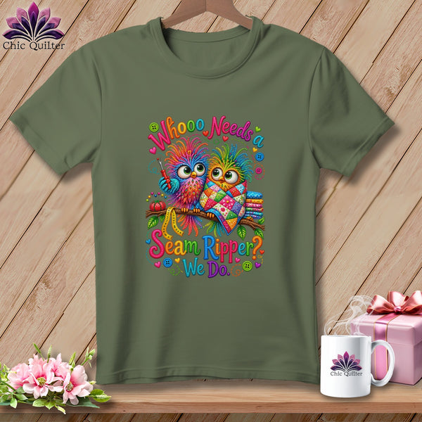 Olive green t-shirt with a colorful graphic of two owls and the text Whoooo Needs a Seam Ripper? We Do.
