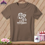 Brown t-shirt with white graphic of rotary cutter, quilt squares, and text 