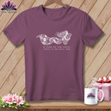 Purple t-shirt with a graphic of a woman holding fabric with text 