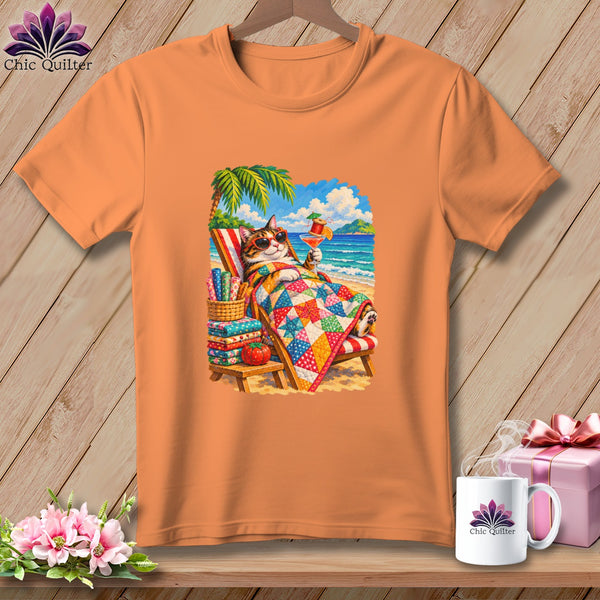 An orange t-shirt featuring a graphic of a cat relaxing in a beach chair under a palm tree.