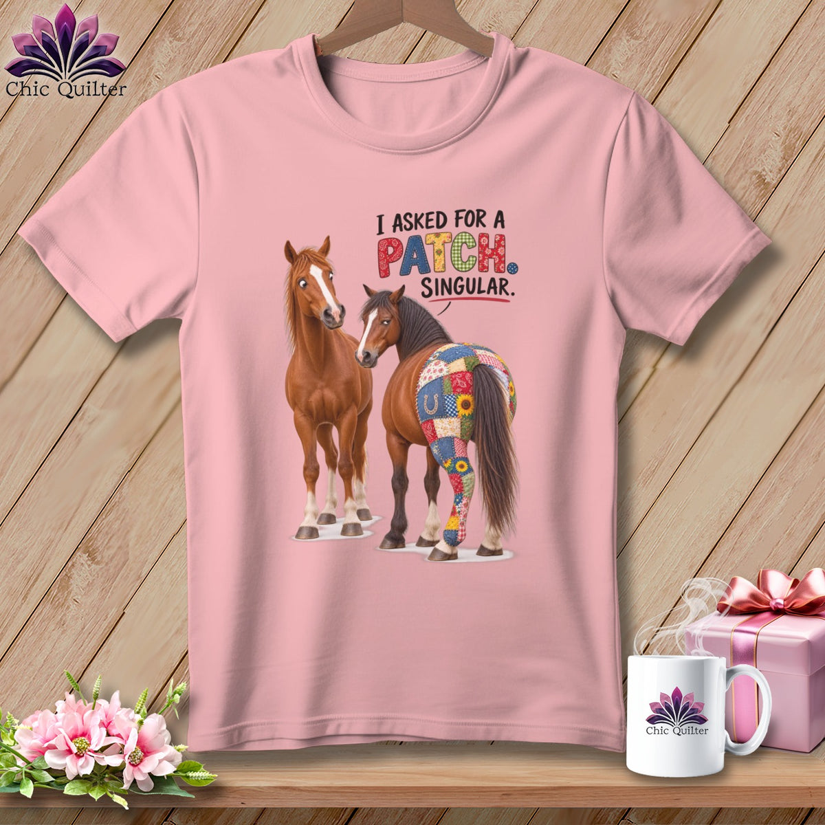 Pink t-shirt with two horses and text "I ASKED FOR A PATCH SINGULAR".