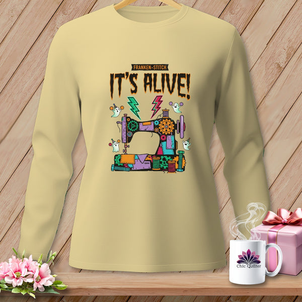 Long sleeve tan shirt with Frankenstein sewing machine, ghosts, and "It's Alive!" text.
