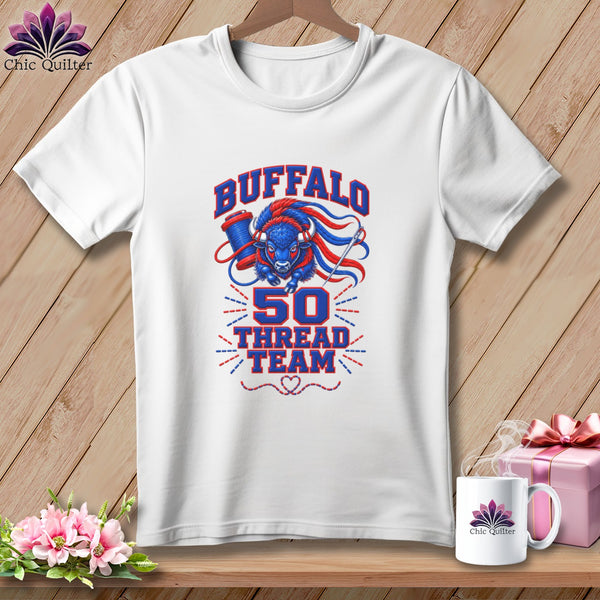 A white short-sleeved t-shirt features a blue and red buffalo graphic with sewing elements and text reading "BUFFALO 50 THREAD TEAM".