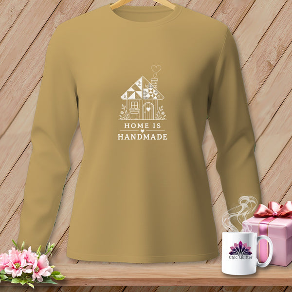 Tan long-sleeve shirt with white house graphic and text "HOME IS HANDMADE".