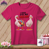 Pink t-shirt with two cartoon geese, one with a patchwork quilt belly. Text reads 