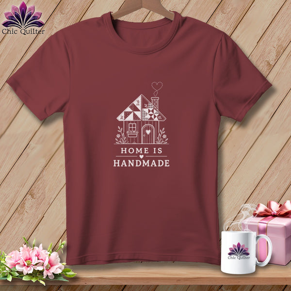 Maroon t-shirt with white house graphic and text "HOME IS HANDMADE".