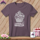 T-shirt with basket of fabric rolls and the text 