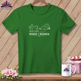 Green t-shirt with sewing machine, mountains, sun, and text 