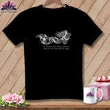 Black t-shirt with a graphic of a woman wrapped in a quilt, holding a quilt roll. Text reads 