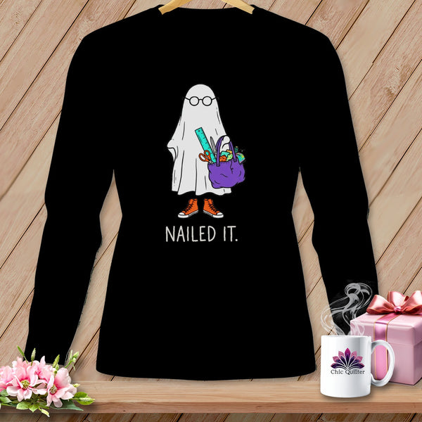 Black long-sleeve shirt with a ghost holding craft supplies and the text "Nailed It."