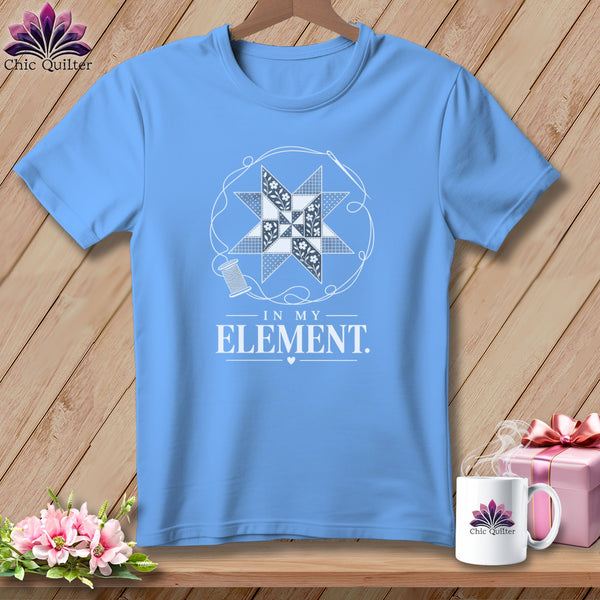 Light blue t-shirt with "In My Element" text and quilting design.