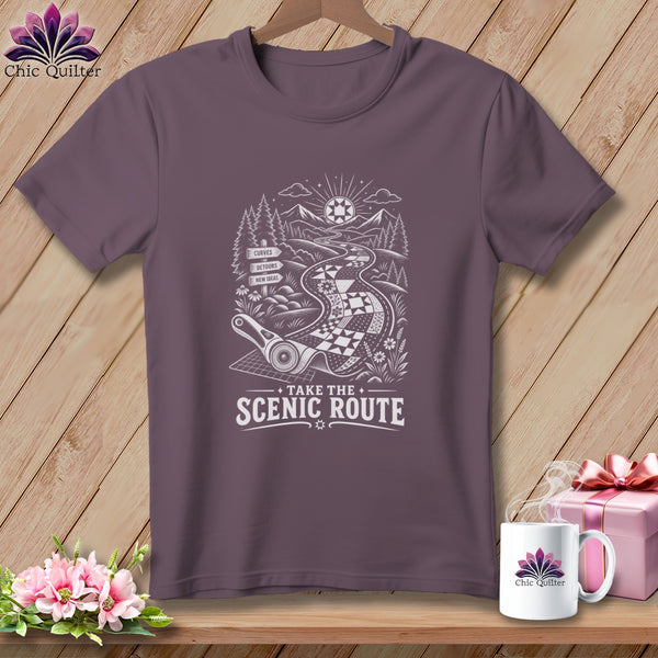 T-shirt with a "Take the Scenic Route" design featuring a quilt road and mountains.
