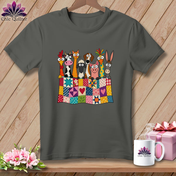 Charcoal t-shirt featuring a cartoon illustration of farm animals peeking over a colorful patchwork quilt.