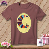 T-shirt featuring a moon made of colorful patchwork with a witch riding a broom.