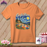An orange t-shirt displays a graphic of a starry night landscape with a colorful quilt foreground and the text 
