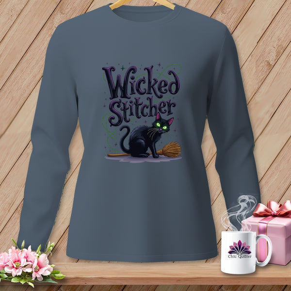 Long-sleeve shirt with black cat, broom, and "Wicked Stitcher" text.