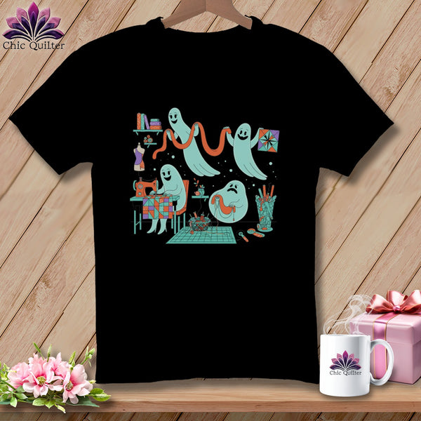 Black t-shirt with ghosts sewing, quilting, and playing with yarn.
