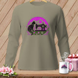 Long-sleeve shirt with a black cat and sewing machine graphic.