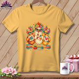 A yellow crewneck t-shirt featuring a colorful graphic of three chickens wearing glasses and floral crowns while holding quilted blocks.