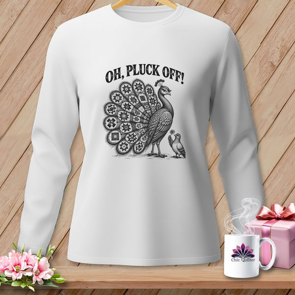 A white long-sleeved shirt printed with a black graphic of a peacock and bird with the text Oh, Pluck Off!