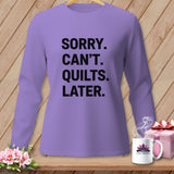 Purple long-sleeved shirt with black text 