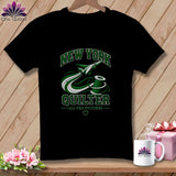 A black t-shirt hanging on a wooden background, featuring green text reading 