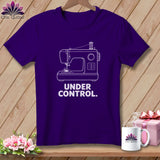 Purple t-shirt with white sewing machine graphic and text 