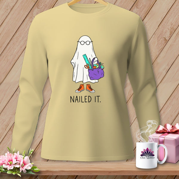 Ghost wearing glasses holding crafting supplies and the text "NAILED IT."