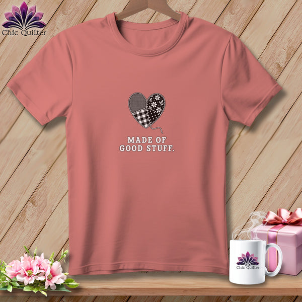 Coral t-shirt with patchwork heart graphic and text "Made of Good Stuff."
