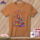 Witch surrounded by fabric rolls and thread, text 