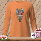Orange long-sleeve shirt with a colorful patchwork heart graphic.