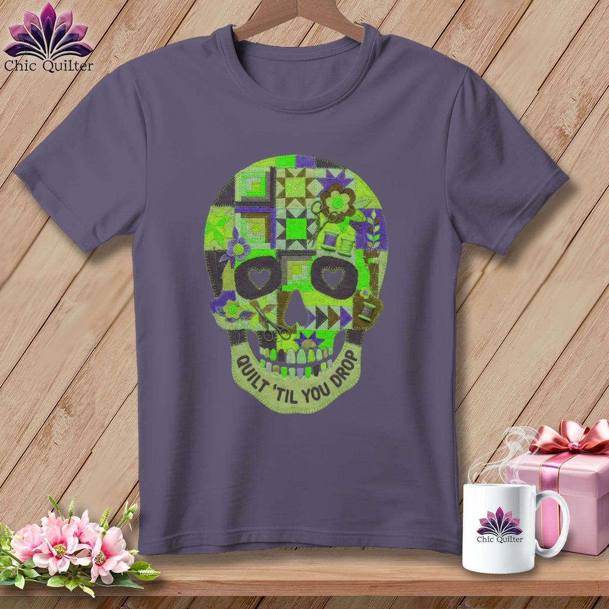 Purple t-shirt with a quilted skull design and "Quilt 'Til You Drop" text.