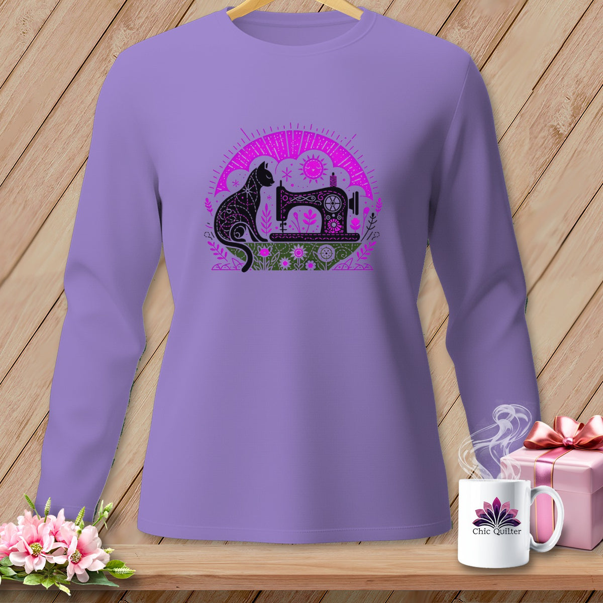 Purple long-sleeve shirt with a black cat and sewing machine graphic.