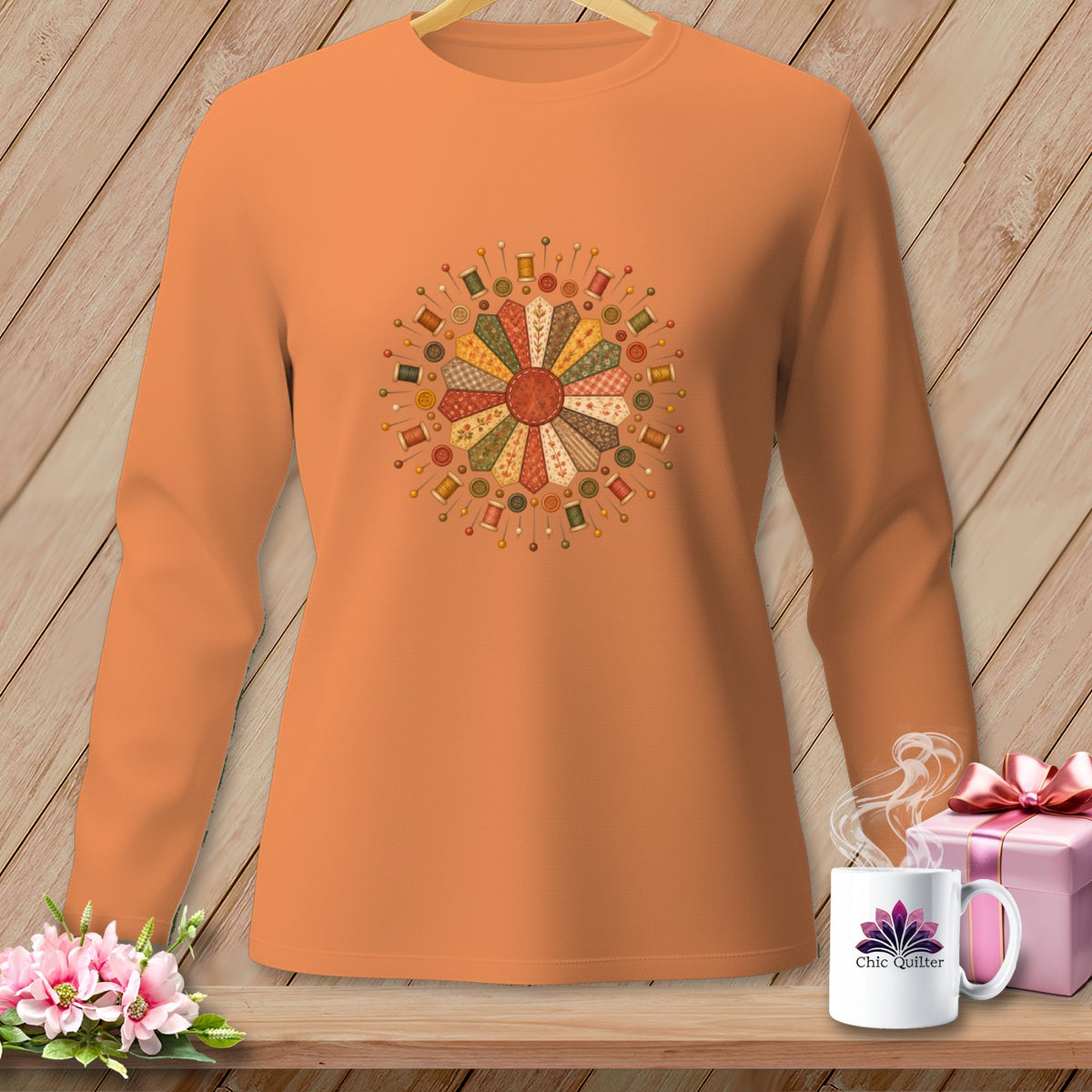 Orange long-sleeve shirt with a dresden plate design of sewing notions.