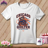 White t-shirt with a blue and orange Chicago Quilter graphic featuring a bear holding a spool.