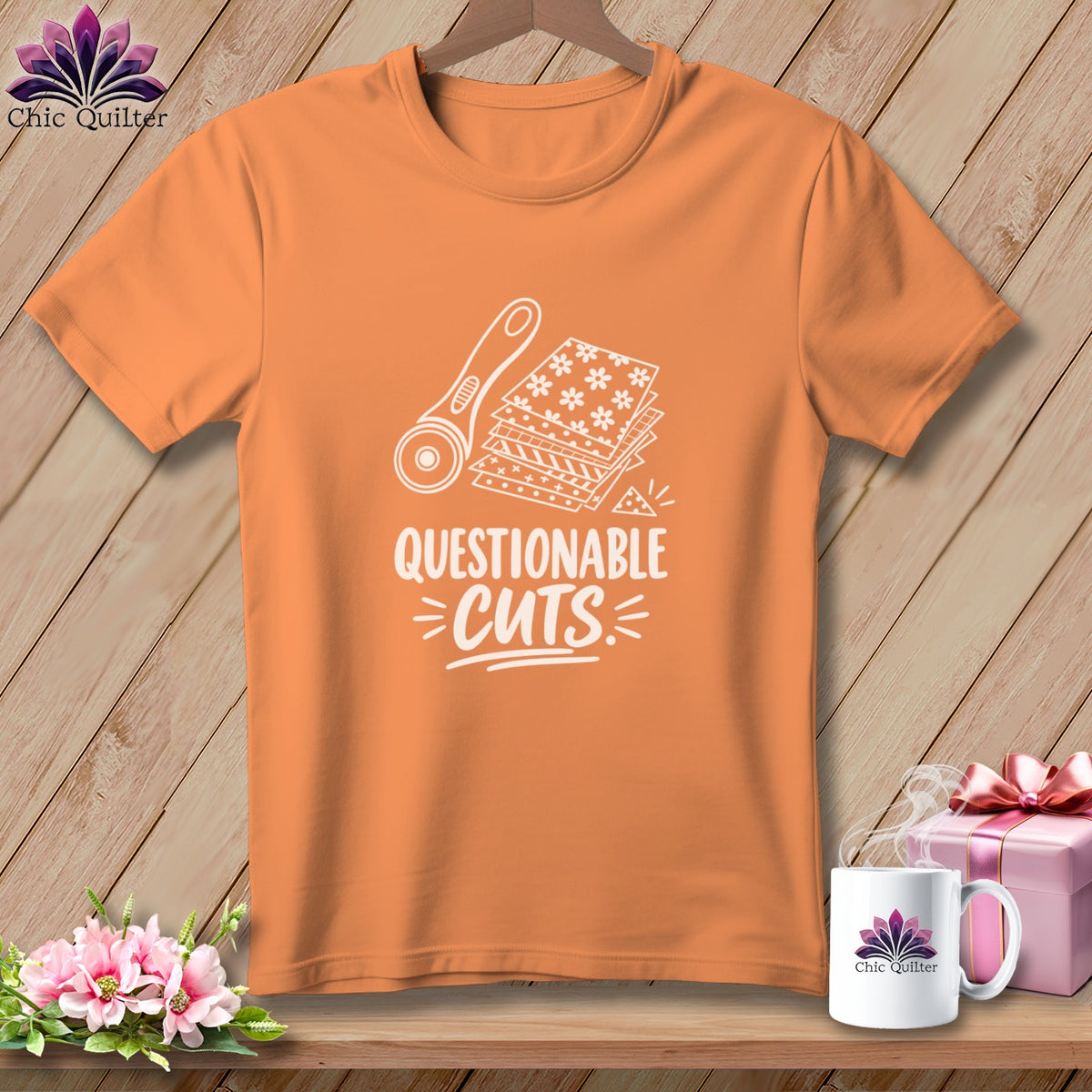 Orange t-shirt with "QUESTIONABLE CUTS" text and quilting rotary cutter graphic.