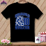 A black t-shirt featuring blue text reading Indianapolis Quilter First Down, Sew On with folded quilts, a measuring tape, and a coffee mug graphic.