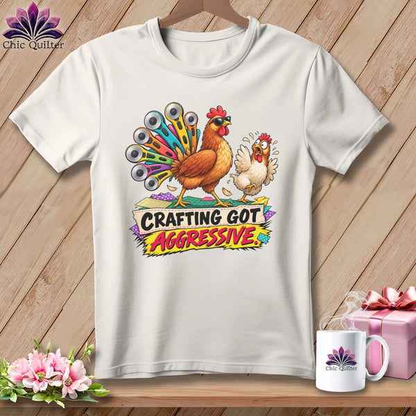 White t-shirt with cartoon chickens and "CRAFTING GOT AGGRESSIVE" text.
