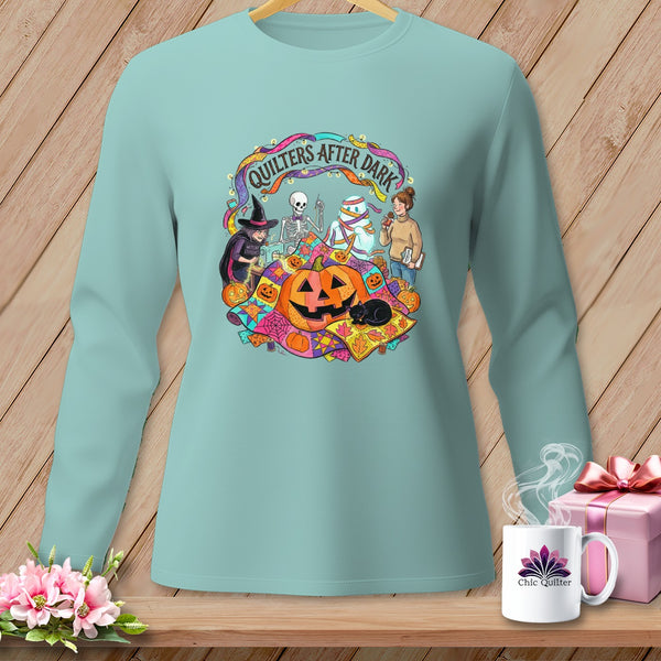 Light blue long-sleeve shirt with "Quilters After Dark" Halloween graphic.