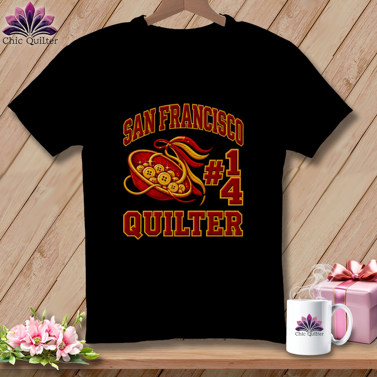 A black t-shirt featuring a San Francisco Quilter graphic with buttons, a bowl, and the number 14.