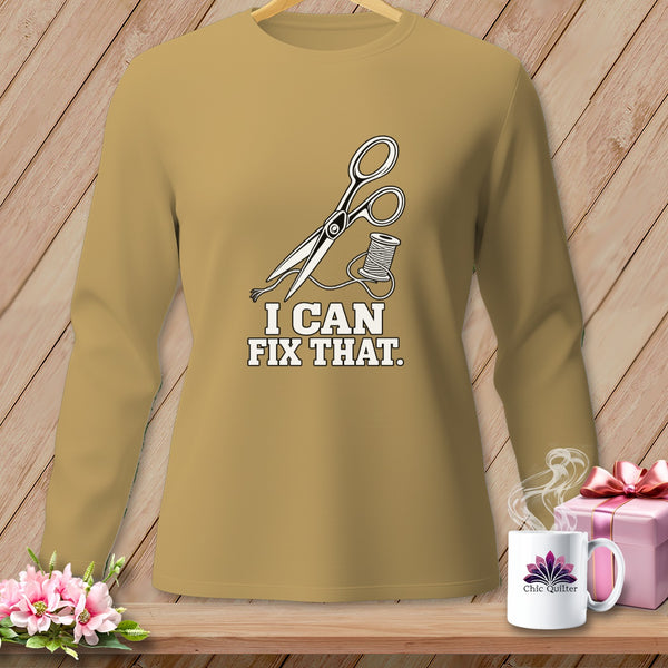 Tan long-sleeve shirt with scissors, thread, and "I Can Fix That." text.