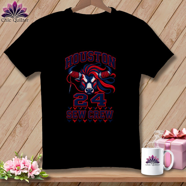 A black crewneck t-shirt featuring a red, white, and blue bull graphic with the text Houston Sew Crew 24.