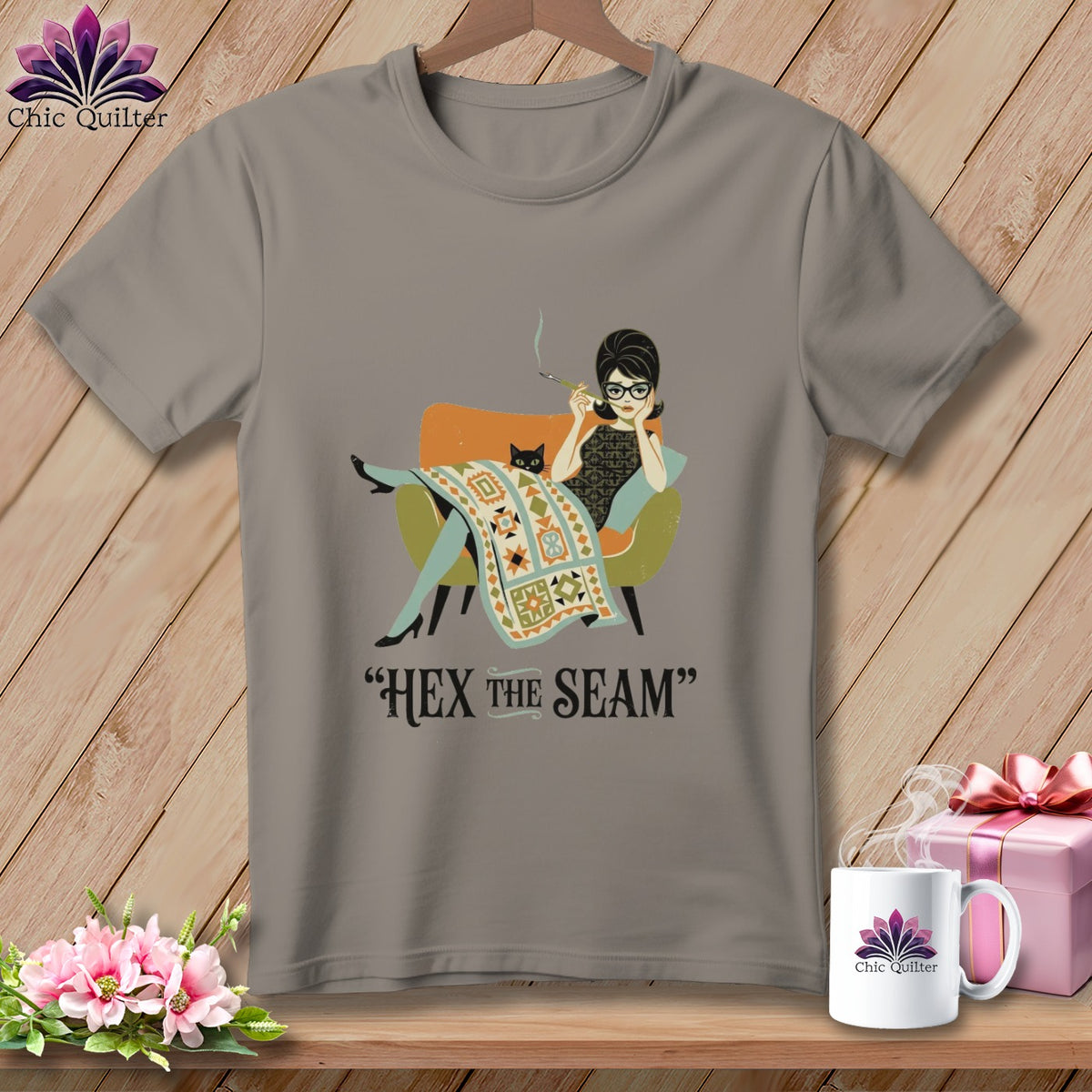 T-shirt with "Hex the Seam" text and illustration of a woman with a cat.