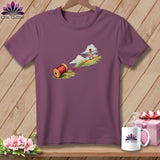 A purple t-shirt featuring a graphic of a person walking on a red thread.