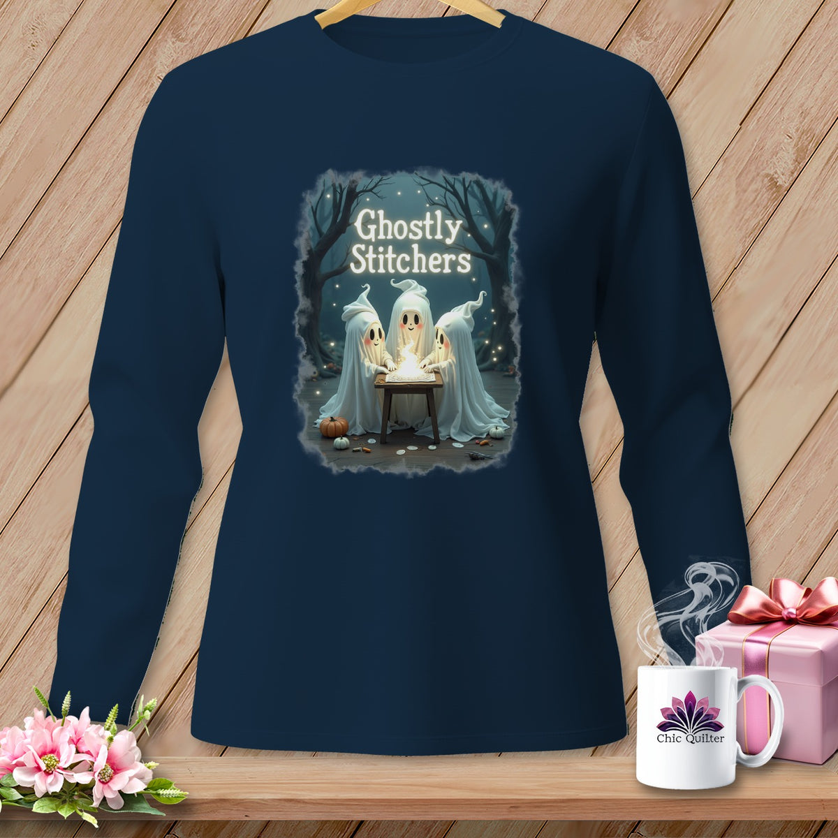 Dark blue long-sleeve shirt with "Ghostly Stitchers" text and three ghosts crafting.