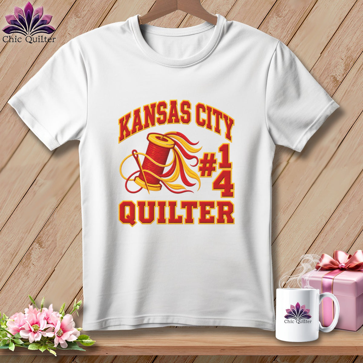 White t-shirt with a red and yellow graphic reading Kansas City Quilter and showing a spool of thread.