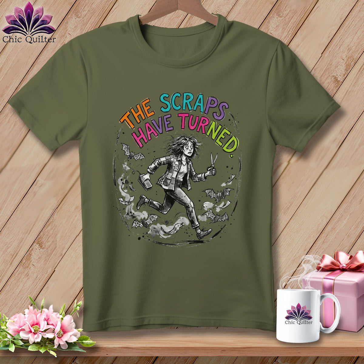 Olive green t-shirt with distressed circular graphic and text "The Scraps Have Turned".